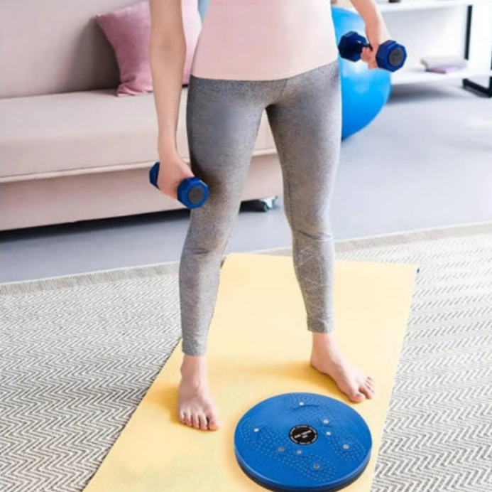 Close-up of feet on CoreTwist Pro during twisting motion workout